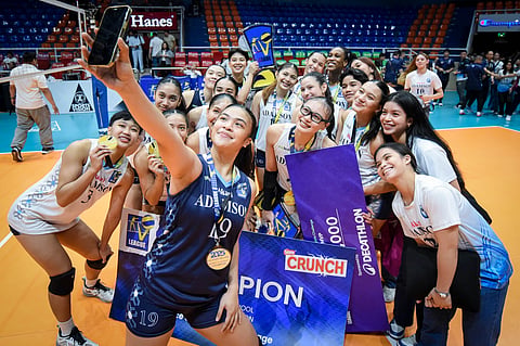 The Adamson University Lady Falcons celebrate their 25-19, 25-19, 25-14 victory over FEU to claim the 2025 Women’s V-League Collegiate Challenge title Friday at the Filoil EcoOil.