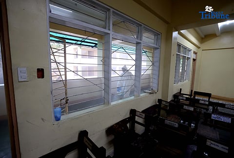 On 14 October 2025, volunteer Parent Teacher Association (PTA) and faculty members wearing personal protective equipment disinfected classrooms and common areas using a water-based solution at Quezon City High School.