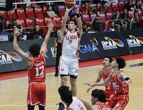 
Comebacking Yukien Andrada provides the scoring spunk in San Beda University’s 81-64 win o er EAC in their Season 101 NCAA men’s basketball tournament game on Tuesday at the Filoil EcoOil Centre.