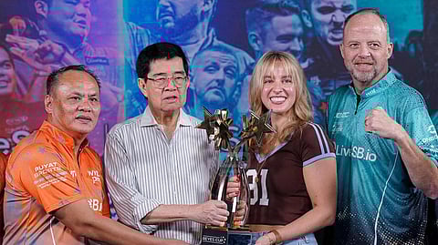 BILLIARDS and Snooker Congress of the Philippines president Putch Puyat (second from left) and Matchroom CEO Emily Frazer (second from right) display the trophy together with Team Asia captain Francisco ‘Django’ Bustamante (left) and Rest of the World skipper Jeremy Jones during the press launch of the 2025 Reyes Cup on Wednesday.    