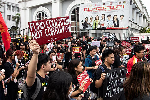Hundreds of Mapúa University students walk out of their classrooms in Manila on Wednesday, 15 October 2025, to protest against widespread government corruption tied to anomalous flood control projects of the Department of Public Works and Highways.
