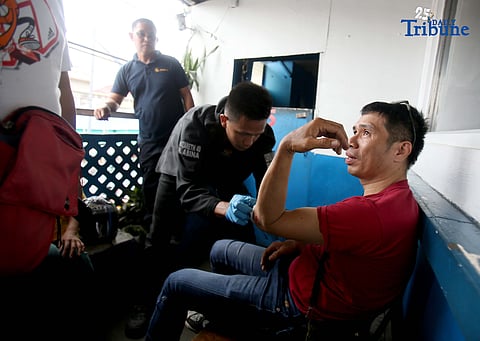 (October 17 2025) Authorities from traffic sector 5 in Quezon City, treated the wounds of one of the rider victim of the road rage incident involving a SUV run over into the motorcycles, along Commonwealth Avenue in Quezon City on Friday, October 17, 2025. Photo/Analy Labor
