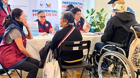 FIRST Lady Liza Araneta-Marcos (seated, left) meets with overseas Filipino workers in Milan, Italy, during the ‘Serbisyo Caravan’ on 15 October.