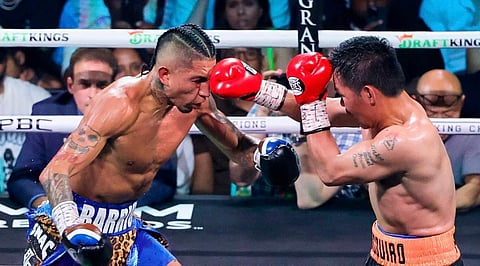 After nearly beating Mario Barrios last July, Manny Pacquiao (right) gets an inquiry to travel to Belfast and meet IBF champion Lewis Crocker.
