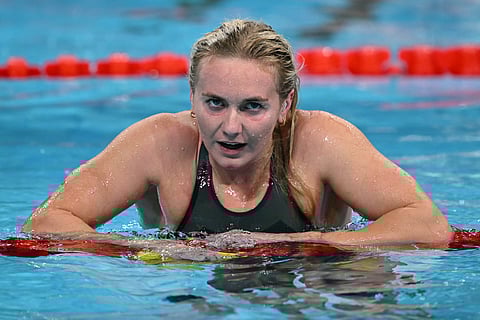 (FILES) Australia's Ariarne Titmus reacts after competing in the final of the women's 800m freestyle swimming event during the Paris 2024 Olympic Games at the Paris La Defense Arena in Nanterre, west of Paris, on August 3, 2024. Four-time Olympic gold medallist Ariarne Titmus announced her immediate retirement from swimming on October 16, 2025, calling it a "really tough" decision as she was lauded as "a living legend".