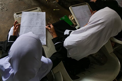 STUDENTS learn basic Arabic at a madrasah in Quiapo, Manila. Keeping girls in school through scholarships and alternative learning programs may help change the CEFMU culture of Muslim families. 