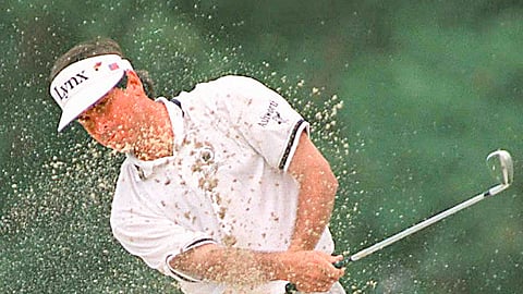 
GETTING out of the bunker seems easy for Fred Couples during his successful stint in the Johnnie Walker Classic at the Orchard Golf and Country Club in Dasmariñas, Cavite in 1995.   
