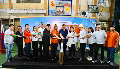 Lighting up communities. Meralco and One Meralco Foundation led the lighting ceremony in Novaliches, Quezon City. Present were (from left) Meralco Valenzuela Sector-Logistics Team lead John Paul D. Bunag, Meralco Valenzuela sector manager Abraham Eñeres, Meralco Head of North Distribution Services Sante Buella, Meralco Head of Home and Micro North Business Area Alleni O. Pascual, Quezon City District 5 action officer William Bawag, Senior Citizen Partylist Representative Rodolfo ‘Ompong’ Ordanes, OMF president and Meralco chief CSR officer Jeffrey O. Tarayao, Quezon City 5th District Representative Patrick Michael Vargas, Barangay Nova Proper captain Asuncion Visaya, Meralco vice president and head of Corporate Communications Joe R. Zaldarriaga, Meralco Novaliches Business Center head Corazon Pilapil, Barangay Nagkaisang Nayon captain Sonny dela Cruz and OMF program manager Michael del Rosario.