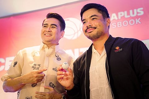 ASIAN Tour campaigner Miguel Tabuena (right) becomes the latest member of the growing ArenaPlus family. Giving him a warm welcome is Total Gamezone Xtreme Inc. representative Jasper Vicencio.