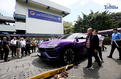 (October 21 2025) Land Transportation Office (LTO) and Bureau of Custom (BOC) personnel were assisting to load into tow truck the seized luxury car Lamborghini owned by a  Korean national, during the turnover to the BOC, held at LTO office in Quezon City on Tuesday October 21 2025.  LTO Chief Asst. Secretary Markus Lacanilao said that the dealer of the said luxury car is the same dealer of some luxury cars of the Discayas. Photo/Analy Labor