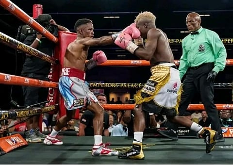 TOP challenger Siyakholwa Kuse (left) vows to bring the WBC strawweight title to South Africa. 