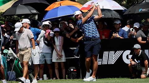 
DUSTIN Johnson swings in front of an electric Filipino crowd during the opening round of the International Series Philippines presented by BingoPlus on Thursday.    