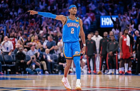 Shai Gilgeous-Alexander #2 of the Oklahoma City Thunder reacts to a play during overtime against the Houston Rockets at Paycom Center on October 21, 2025 in Oklahoma City, Oklahoma.