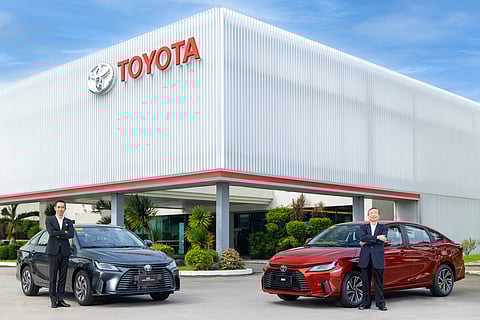 Toyota Motor Philippines introduces the all-new Toyota ATIV, its most affordable Hybrid Electric Vehicle to date, featuring a sleek fastback silhouette, spacious interior, and Toyota Safety Sense. With the top-of-the-line HEV variant starting at P1,198,000, the Toyota ATIV is thoughtfully designed for Filipinos taking their first step into hybrid mobility. Retail of the Toyota ATIV starts today in all Toyota dealerships nationwide. Photo shows Masando Hashimoto (left), president of Toyota Motor Philippines, and Dr. David T. Go, vice chairman of Toyota Motor Philippines, with the HEV and gas variants of the Toyota ATIV.