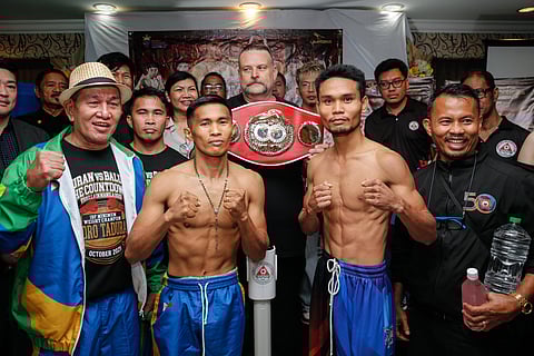 
Defending champion Pedro Taduran (left) and mandatory challenger Christian Balunan show their readiness for their IBF minimumweight title clash on Sunday at the San Andres Sports Complex in Malate, Manila.
