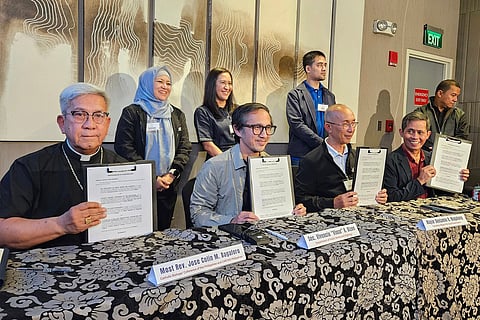 Caritas Philippines president Bishop Jose Colin Bagaforo (left) signs a memorandum of cooperation with the Department of Public Works and Highways, Mayors for Good Governance, and Taongbayan’s Action for Participatory, Accountable and Transparent (TAPAT) Governance on Oct. 24, 2025.