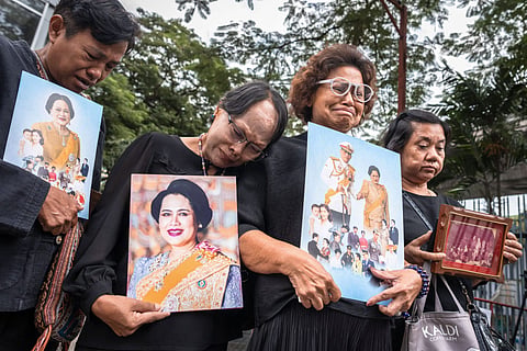 Thais mourning the passing of their Queen Mother. Photo: Chanakarn Laosarakham / AFP 
