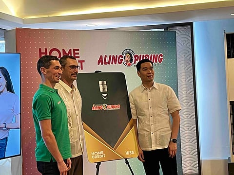 LEFT TO RIGHT: Home Credit Philippines Chief CRM Officer Petr Lukosz; Zdenek Jankovsky, Chief Business Development Officer at Home Credit Philippines, and Puregold Price Club, Inc. president Vincent Co, unveiled the Home Credit-Puregold Credit Card on Monday in Quezon City.