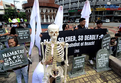 (October 28 2025) Youth leaders and members of the Sin Tax Coalition hold a halloween themed action at Brgy. South Triangle, Quezon City on Tuesday October 28 2025, to urge for higher alcohol taxes amid rising deaths and illnesses among young people of alcohol related. The symbolic action titled “So Cheap, So Deadly” feature tombstones representing lives lost to alcohol and ghost figures representing the alcohol industry. The campaign seeks to urge lawmakers to pass stronger alcohol control measures, including higher alcohol taxes, to protect young people. Photo/Analy Labor