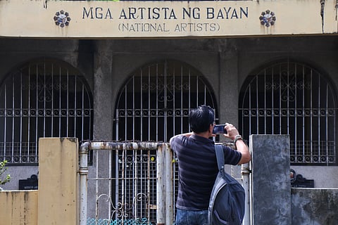 A curious visitor drops by the mausoleum of National Artists Amado Vera Hernandez and Honorata dela Rama at the Manila North Cemetery on 28 October 2025. Ka Amado, a labor leader and writer, was posthumously honored as National Artist for Literature in 1973, while his wife, Honorata, also known as Ka Atang, was proclaimed National Artist for Theatre and Music on 08 May 1987. 