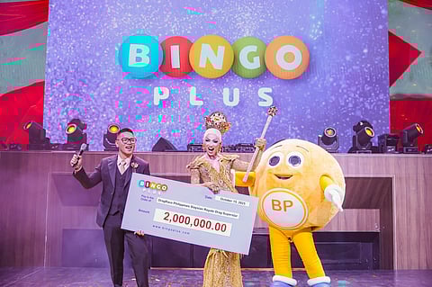 First Drag Race Philippines Slaysian Royale winner Brigiding receives the ₱2 million cheque prize powered by BingoPlus 