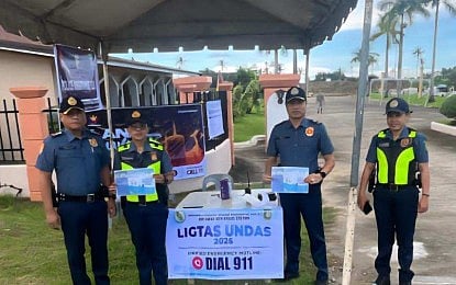 Police officers take positions at cemeteries in Negros Oriental on Friday, 31 October, as part of security preparations for the All Saints’ and All Souls’ Day observance.