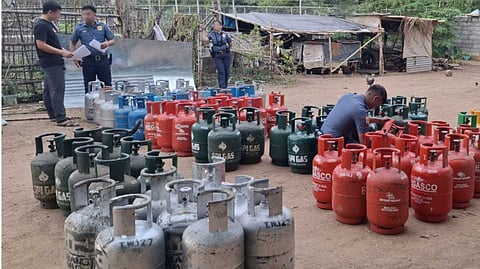 AUTHORITIES seize 21 filled and 86 empty counterfeit LPG cylinders valued at around P200,000 during a raid in Cauayan City, Isabela, on 27 October, arresting two suspects for trademark infringement.