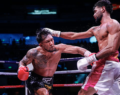 
Eumir Marcial (left) swears he learned a lot of lessons after getting a taste of hell from Venezuelan Eddy Colmenares last Thursday during the Thrilla in Manila golden anniversary festivities at the Smart Araneta Coliseum.
