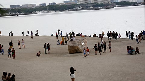 LOCAL tourist spend time at Dolomite Beach at Manila Bay in Manila to watch the sunset on Sunday, 30 March..