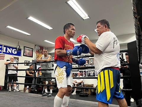 Manny Pacquiao and longtime trainer Buboy Fernandez have been a perfect blend all these years.