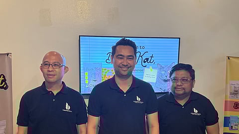 Julius Ladica, Douglas Baarde, Jr., and Wilson Samoranos are the three executives of United Baarde, Inc., at the launching of  Dear Kat cat food. 