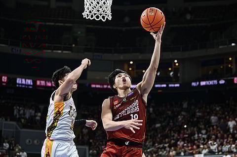 
HAROLD Alarcon delivers the game-winning basket in UP’s 89-88 victory over UST in the UAAP Season 88 men’s basketball tournament.  