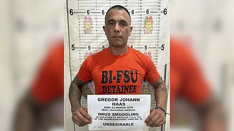 Filipino-Australian Gregor Johann Haas’ mugshot is shown after he was arrested in the Philippines following an international manhunt and efforts were underway to have the suspect extradited to Jakarta to face charges. 