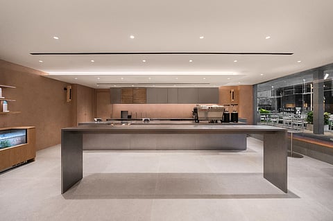 Serene, modern setting where stainless steel, warm terracotta and oak echo the timeless elegance in Singapore’s iconic lifestyle precinct