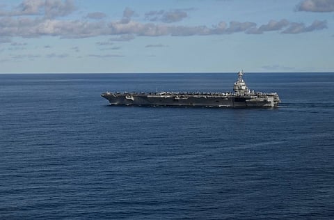 The world’s largest aircraft carrier USS Gerald R. Ford, seen here in the North Sea on Sept. 24, arrived in Latin America on Tuesday, 2025, escalating a military buildup that Venezuela has warned could trigger a full-blown conflict as it announced its own deployment.