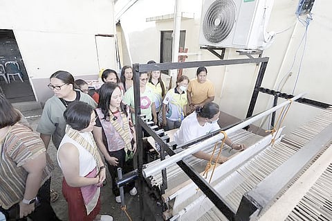 Pilipinas Shell Corporation president and CEO Lorelie Quiambao-Osial (left) and Quezon City Mayor Joy Belmonte (second from left) lead the launch of the first Textile Circularity Hub in Payatas, together with representatives from ANTHILL, the Maybank Foundation and the Pilipinas Shell Foundation Inc.