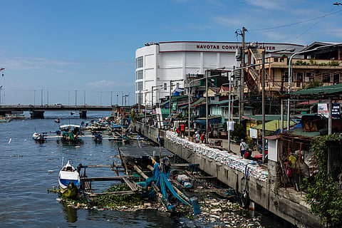 Workers from the Department of Public Works and Highways (#DPWH) repair a section of the collapsed seawall in Barangay Bagumbayan South, #NavotasCity, on Wednesday, 12 November 12, after it was damaged by Super Typhoon #UwanPH.