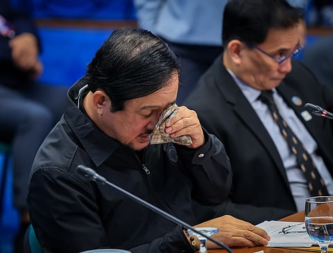 Former Department of Public Works and Highways (DPWH) Undersecretary Engr. Roberto Bernardo sheds tears as he exposes the alleged corruption involving DPWH officials during the Blue Ribbon Committee hearing on Friday