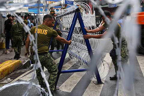 Police personnel install razor wires, concrete barriers, and container vans in various streets leading towards Malacañang compound in Manila on 15 November 2025, in preparation for the upcoming anti-corruption protests.

The following streets, General Solano, Nicanor Padilla, Arlegui, and Mendiola, are no longer accessible to motorists.