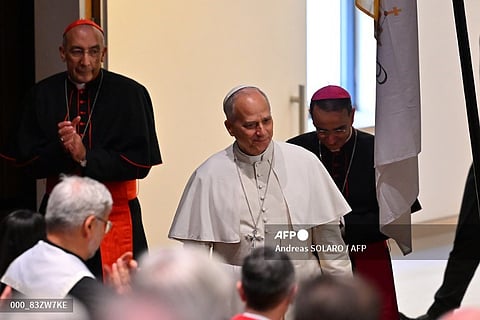 VATICAN-ITALY-RELIGION-POPE
Pope Leo XIV (C) arrives for the opening of the Dies Academicus, the official inauguration of the 2025-2026 Academic Year at the Aula Magna of the Pontifical Lateran University which, in a special capacity, constitutes the 'Pope's University, in Rome on November 14, 2025.
