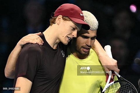 TENNIS-ITALY-ATP-FINALS
Italy's Jannik Sinner (L) is congratulated by Spain's Carlos Alcaraz at the end of their men's single final match at the ATP Finals tennis tournament, in Turin, on November 16, 2025.
