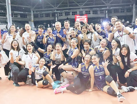 
NU chairman Hans Sy and team manager Mariano See Diet join the Lady Bulldogs in their celebration after winning their fourth consecutive Shakey’s Super League Preseason Unity Cup crown late Saturday. 