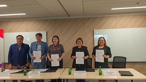 Aboitiz Foundation and ING Hubs officials celebrate their new partnership to bring solar power and digital learning tools to remote schools in Bulacan.