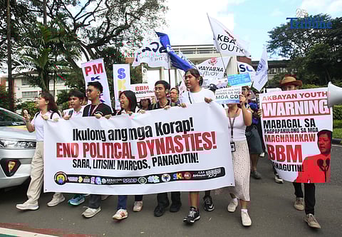 Student Youth Against Kurakot members march around the University of the Philippines–Diliman academic oval in celebration of International Students’ Day, holding placards bearing a symbolic “guilty verdict” against government officials linked to the flood control scandal. The youth group called for accountability and reforms as they staged their protest on campus in Quezon City on Monday.