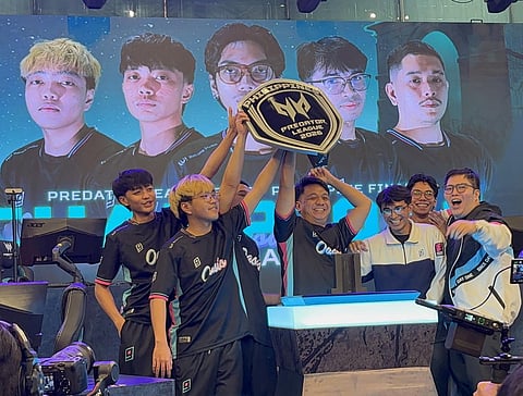 Members of the Oasis Gaming team celebrate their Predator League 2026 conquest at SM North EDSA Annex. 
 