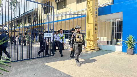 Security personnel of ISAT-U, along with the Explosive Ordnance Division, secure the university after it received another bomb threat.