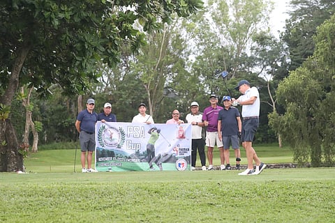 NATIONAL Golf Association of the Philippines chairman Al Panlilio (right) hits the ceremonial tee shot during the PSA Cup last Monday at the Legends Course of the Southwoods Golf and Country Club.