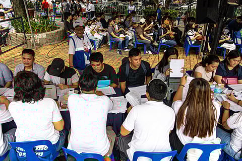 Jobseekers flock to the Manila City Hall Freedom Triangle during the city’s Mega Job Fair, organized in partnership with the Public Employment Service Office–Manila, the Department of Labor and Employment–Manila Field Office, and San Miguel Corporation, on Wednesday, 19 November 2025.
