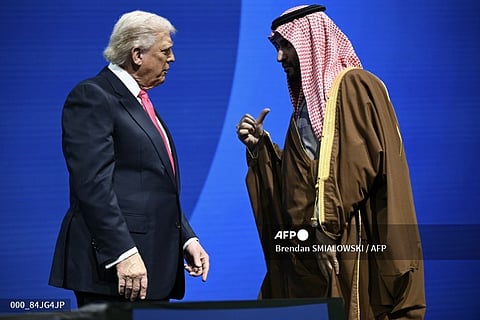 US-SAUDI ARABIA-POLITICS-TECHNOLOGY-ENERGY
US President Donald Trump speaks with Crown Prince and Prime Minister of the Kingdom of Saudi Arabia Mohammed bin Salman at the US-Saudi Investment Forum at the John F. Kennedy Center for the Performing Arts in Washington, DC on November 19, 2025.
