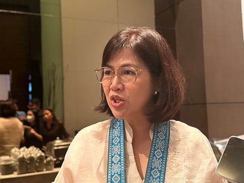 Philhydro Association president Gertrude Roque discusses industry concerns on run-of-river hydro incentives at the sidelines of the group’s Quezon City summit.